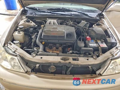 Zdjęcie 11 z 12 samochodu: 2003 TOYOTA AVALON XLS VIN:4T1BF28B73U332177 - miniatura