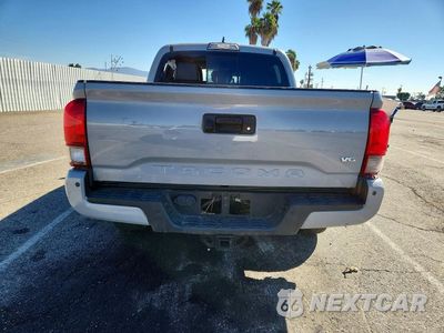 Zdjęcie 6 z 12 samochodu: 2019 TOYOTA TACOMA TRD SPORT VIN:3TMAZ5CNXKM091681 - miniatura