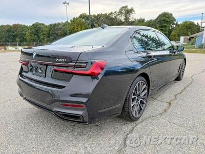 Czwarte zdjęcie samochodu z boku: 2022 BMW 740 XI VIN:WBA7T4C03NCK23662 - miniatura