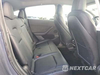Zdjęcie 10 z 12 samochodu: 2023 TESLA MODEL Y VIN:7SAYGDEF6PF582459 - miniatura