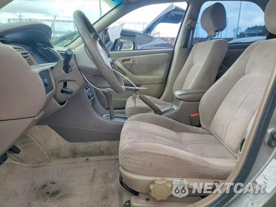 Zdjęcie 7 z 12 samochodu: 1997 TOYOTA CAMRY LE VIN:JT2BG22K4V0033369 - miniatura