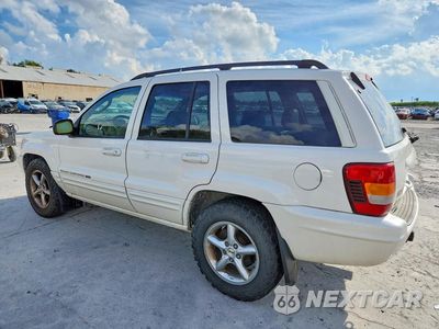 Drugie zdjęcie samochodu z przodu: 2002 JEEP GRAND CHEROKEE LIMITED VIN:1J8GW58J22C272597 - miniatura