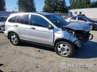 Czwarte zdjęcie samochodu z boku: 2010 HONDA CR-V LX VIN:5J6RE3H32AL040602 - miniatura