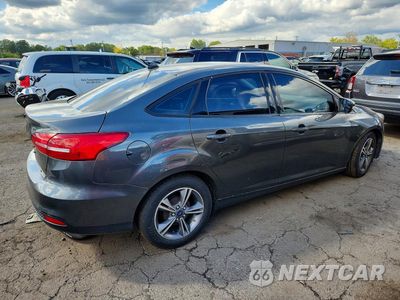Trzecie zdjęcie samochodu z tyłu: 2018 FORD FOCUS SE VIN:1FADP3F20JL268298 - miniatura