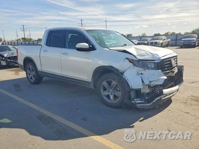 Czwarte zdjęcie samochodu z boku: 2022 HONDA RIDGELINE VIN:5FPYK3F76NB003875 - miniatura