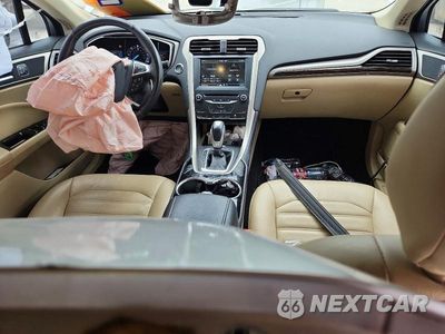 Zdjęcie 8 z 12 samochodu: 2015 FORD FUSION SE PHEV VIN:3FA6P0PUXFR181718 - miniatura