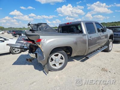 Trzecie zdjęcie samochodu z tyłu: 2013 GMC SIERRA K2500 SLT VIN:1GT121CG2DF177309 - miniatura