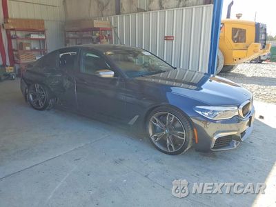 Czwarte zdjęcie samochodu z boku: 2020 BMW M550XI VIN:WBAJS7C08LBN96564 - miniatura