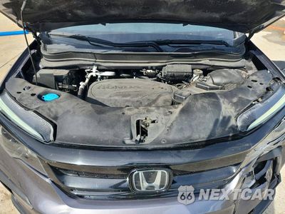 Zdjęcie 12 z 13 samochodu: 2021 HONDA PILOT SE VIN:5FNYF5H29MB042324 - miniatura