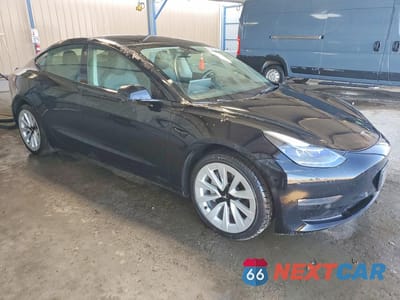 Czwarte zdjęcie samochodu z boku: 2022 TESLA MODEL 3 VIN:5YJ3E1EBXNF290576 - miniatura