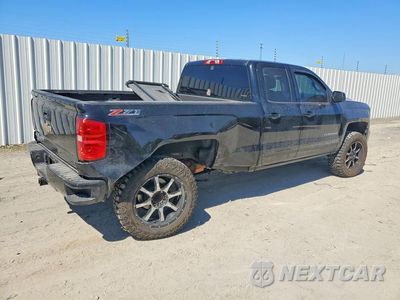 Trzecie zdjęcie samochodu z tyłu: 2017 CHEVROLET SILVERADO K1500 LT VIN:1GCVKREC6HZ348450 - miniatura