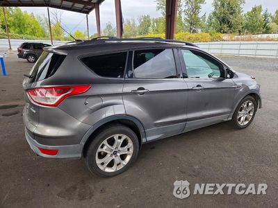 Trzecie zdjęcie samochodu z tyłu: 2013 FORD ESCAPE SE VIN:1FMCU0G95DUC03515 - miniatura