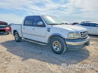 Czwarte zdjęcie samochodu z boku: 2002 FORD F150 SUPERCREW VIN:1FTRW07602KE34412 - miniatura