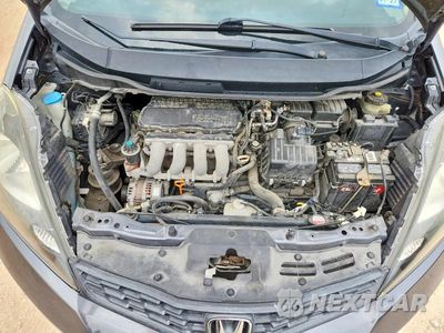 Zdjęcie 11 z 12 samochodu: 2013 HONDA FIT SPORT VIN:JHMGE8H53DC007428 - miniatura
