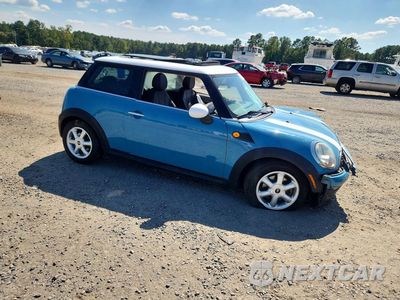 Czwarte zdjęcie samochodu z boku: 2010 MINI COOPER VIN:WMWMF3C52ATU79138 - miniatura