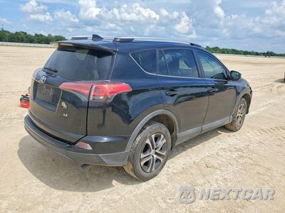Trzecie zdjęcie samochodu z tyłu: 2018 TOYOTA RAV4 LE VIN:2T3ZFREV9JW498064 - miniatura