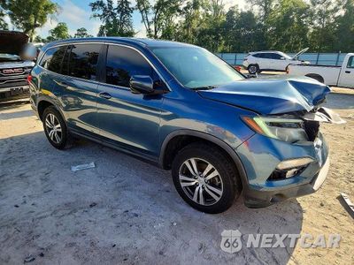 Czwarte zdjęcie samochodu z boku: 2017 HONDA PILOT EXL VIN:5FNYF5H59HB025538 - miniatura