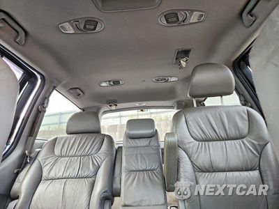 Zdjęcie 10 z 14 samochodu: 2010 HONDA ODYSSEY EXL VIN:5FNRL3H77AB040404 - miniatura