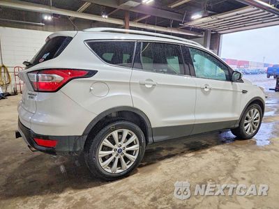 Trzecie zdjęcie samochodu z tyłu: 2017 FORD ESCAPE TITANIUM VIN:1FMCU9JD0HUB60869 - miniatura