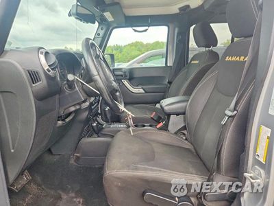 Zdjęcie 7 z 12 samochodu: 2015 JEEP WRANGLER UNLIMITED SAHARA VIN:1C4BJWEG5FL626777 - miniatura