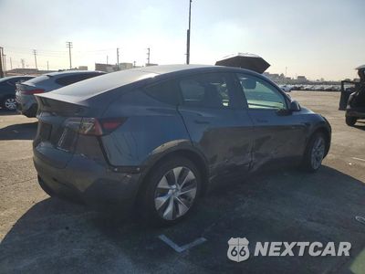 Trzecie zdjęcie samochodu z tyłu: 2023 TESLA MODEL Y VIN:7SAYGDEF2PA048534 - miniatura