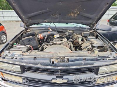 Zdjęcie 12 z 13 samochodu: 1999 CHEVROLET TAHOE K1500 VIN:1GNEK13R5XJ322595 - miniatura