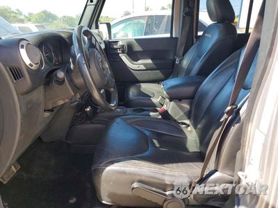 Zdjęcie 7 z 13 samochodu: 2017 JEEP WRANGLER UNLIMITED SAHARA VIN:1C4BJWEGXHL590166 - miniatura