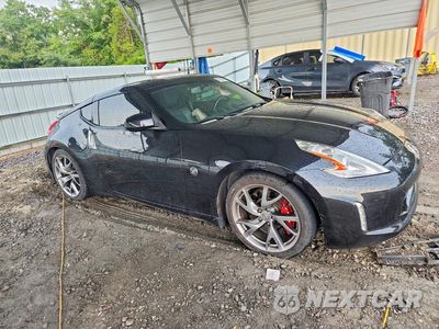 Czwarte zdjęcie samochodu z boku: 2014 NISSAN 370Z TOURING VIN:JN1AZ4EH8EM636765 - miniatura