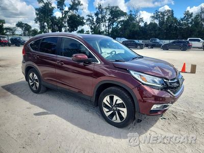 Czwarte zdjęcie samochodu z boku: 2016 HONDA CR-V TOURING VIN:5J6RM3H91GL008093 - miniatura