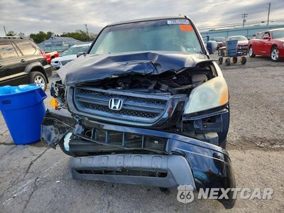Piąte zdjęcie samochodu w środku: 2005 HONDA PILOT EX VIN:2HKYF184X5H551318 - miniatura