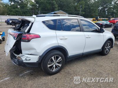 Trzecie zdjęcie samochodu z tyłu: 2018 TOYOTA RAV4 XLE VIN:JTMWFREV3JJ161049 - miniatura