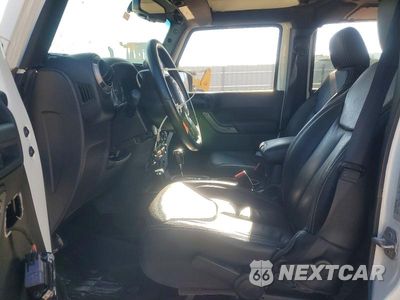 Zdjęcie 7 z 12 samochodu: 2015 JEEP WRANGLER UNLIMITED SPORT VIN:1C4BJWDG0FL666170 - miniatura