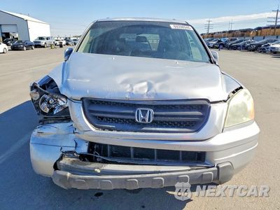 Piąte zdjęcie samochodu w środku: 2005 HONDA PILOT EXL VIN:2HKYF18595H531330 - miniatura