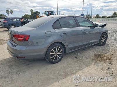 Trzecie zdjęcie samochodu z tyłu: 2017 VOLKSWAGEN JETTA SE VIN:3VWDB7AJ2HM298309 - miniatura
