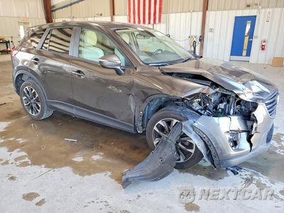Czwarte zdjęcie samochodu z boku: 2016 MAZDA CX-5 GT VIN:JM3KE4DY6G0896498 - miniatura