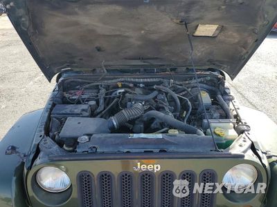 Zdjęcie 12 z 13 samochodu: 2007 JEEP WRANGLER SAHARA VIN:1J4GA59187L141471 - miniatura