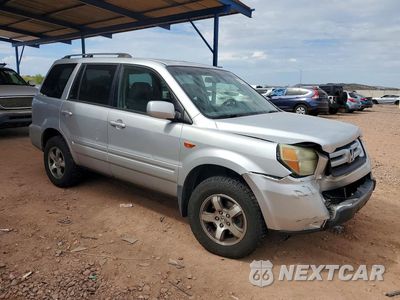 Czwarte zdjęcie samochodu z boku: 2006 HONDA PILOT EX VIN:2HKYF18746H520559 - miniatura