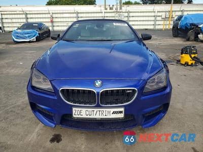 Piąte zdjęcie samochodu w środku: 2012 BMW M6 VIN:WBSLZ9C51CC985483 - miniatura