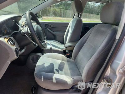 Zdjęcie 7 z 12 samochodu: 2002 FORD FOCUS LX VIN:1FAFP33P32W307037 - miniatura