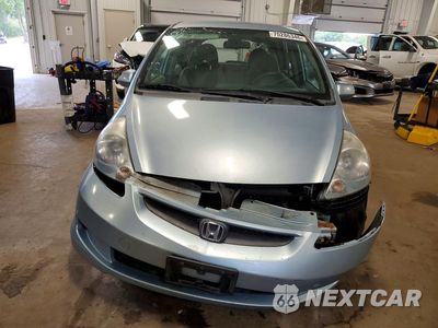 Piąte zdjęcie samochodu w środku: 2007 HONDA FIT VIN:JHMGD38457S030605 - miniatura