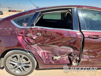 Zdjęcie 10 z 12 samochodu: 2017 FORD FUSION SE HYBRID VIN:3FA6P0LU6HR142097 - miniatura