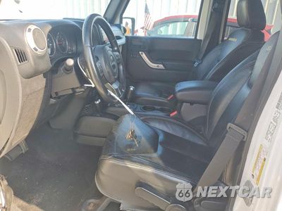 Zdjęcie 7 z 13 samochodu: 2013 JEEP WRANGLER UNLIMITED SAHARA VIN:1C4BJWEG3DL575695 - miniatura