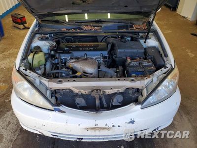 Zdjęcie 11 z 12 samochodu: 2002 TOYOTA CAMRY SE VIN:JTDBE32K820053705 - miniatura