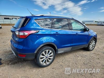 Trzecie zdjęcie samochodu z tyłu: 2017 FORD ESCAPE TITANIUM VIN:1FMCU9J92HUB80973 - miniatura