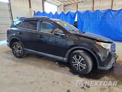 Czwarte zdjęcie samochodu z boku: 2016 TOYOTA RAV4 LE VIN:2T3BFREV1GW462315 - miniatura