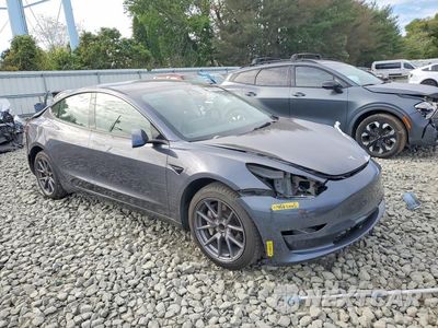Czwarte zdjęcie samochodu z boku: 2023 TESLA MODEL 3 VIN:5YJ3E1EA6PF674302 - miniatura