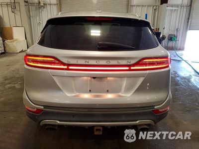 Zdjęcie 6 z 13 samochodu: 2015 LINCOLN MKC VIN:5LMCJ2A94FUJ04777 - miniatura