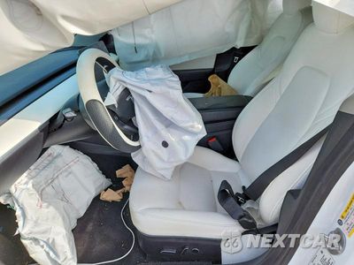 Zdjęcie 7 z 12 samochodu: 2021 TESLA MODEL 3 VIN:5YJ3E1EA1MF927599 - miniatura