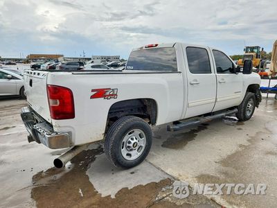 Trzecie zdjęcie samochodu z tyłu: 2013 CHEVROLET SILVERADO K2500 HEAVY DUTY LT VIN:1GC1KXE8XDF130764 - miniatura