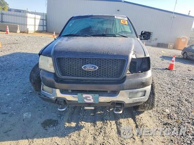 Piąte zdjęcie samochodu w środku: 2004 FORD F150 VIN:1FTPX14544NB28711 - miniatura